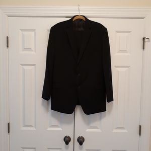 Men's Calvin Klein black suit.